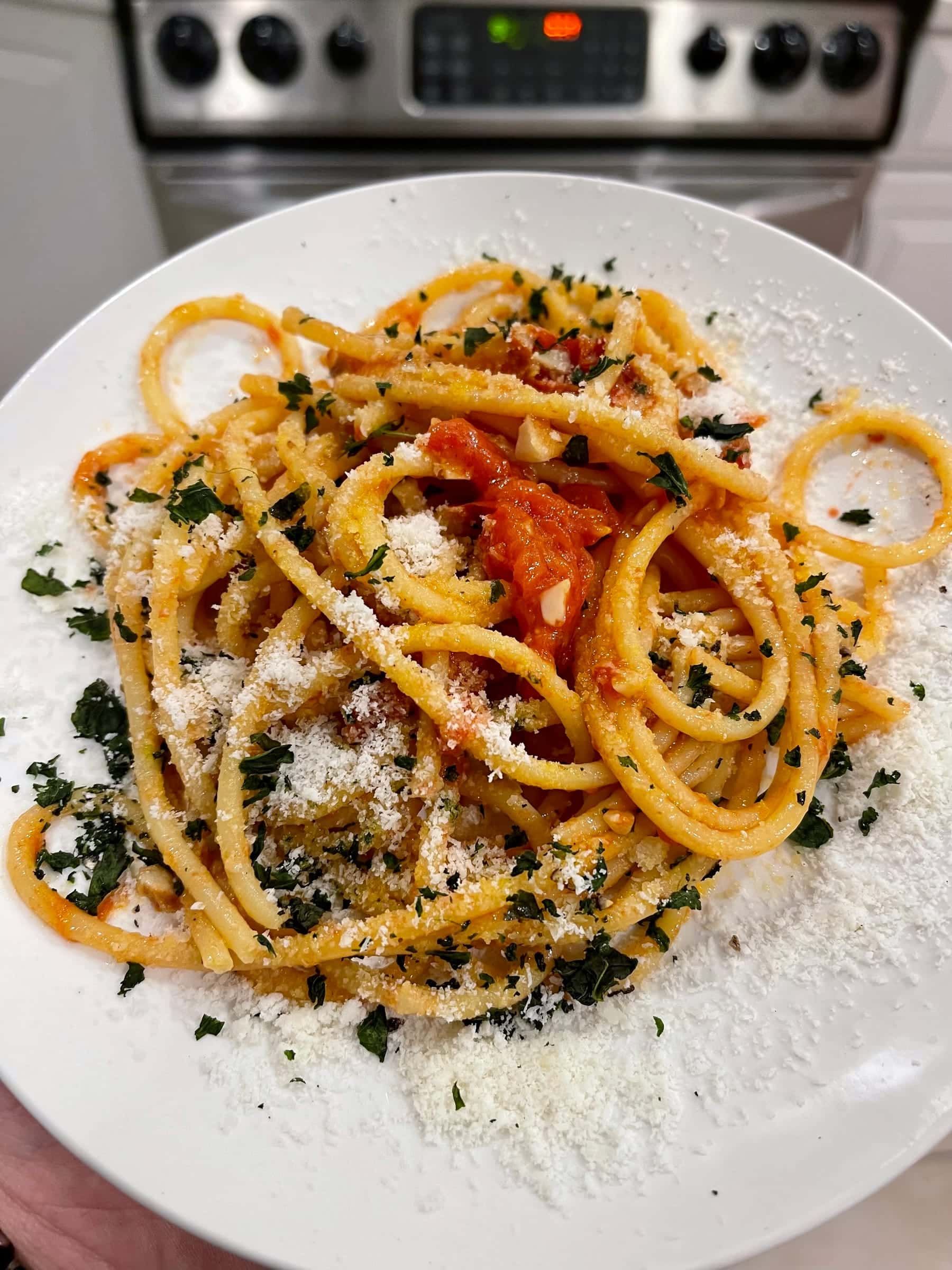 Bucatini pomodoro with parmesan and parsley