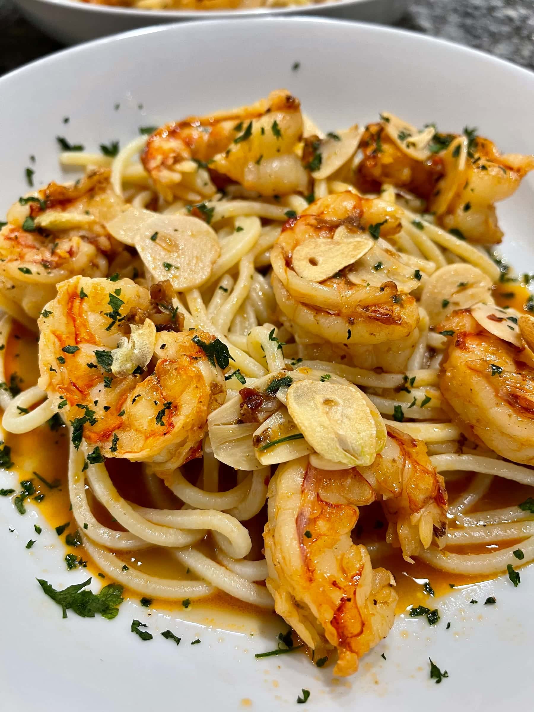 Garlic shrimp linguine with sliced garlic and parsley