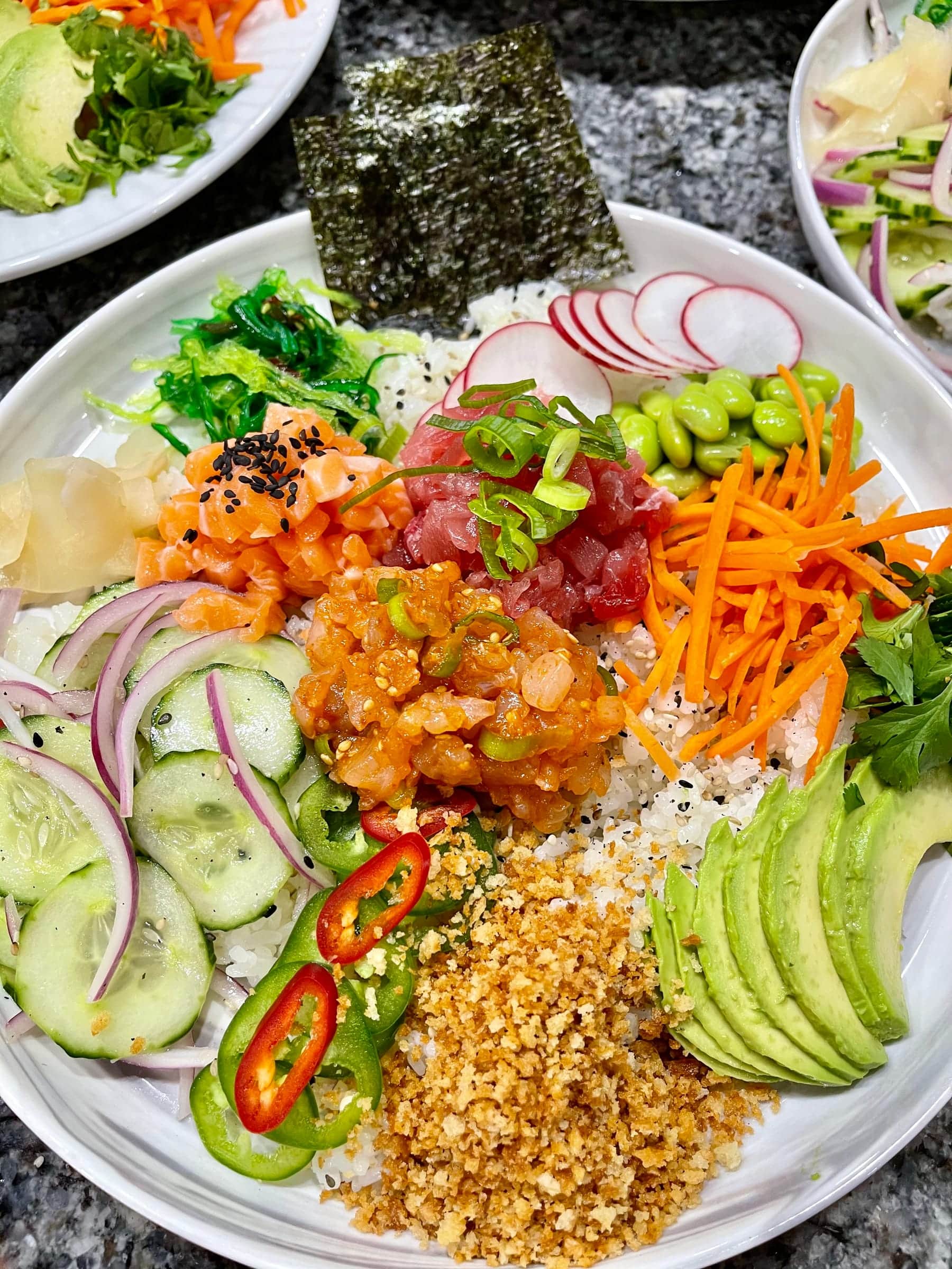 Poke bowls built to order at a station