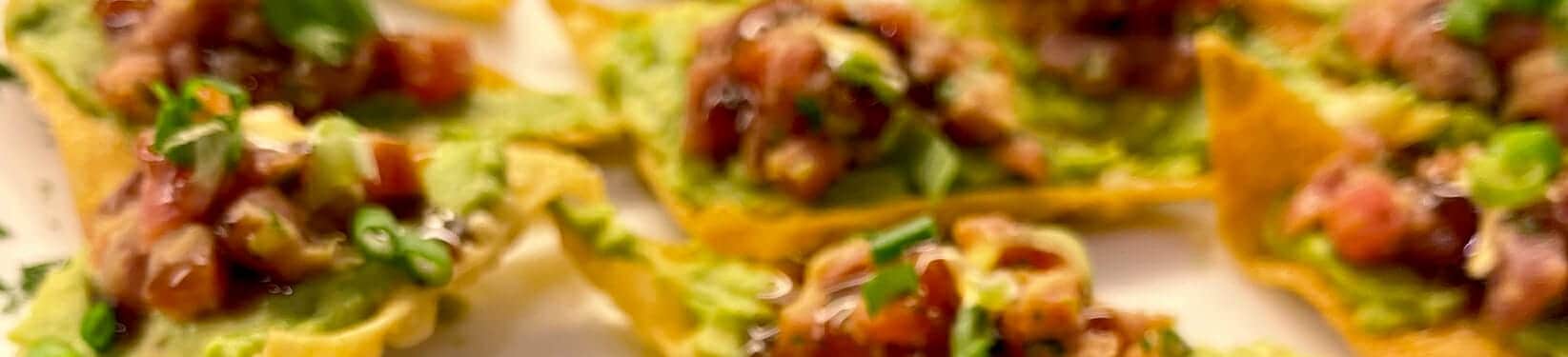 Butter lettuce cup filled with chopped salad and avocado