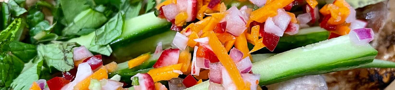 Close-up of a chopped salad with peppers and carrot