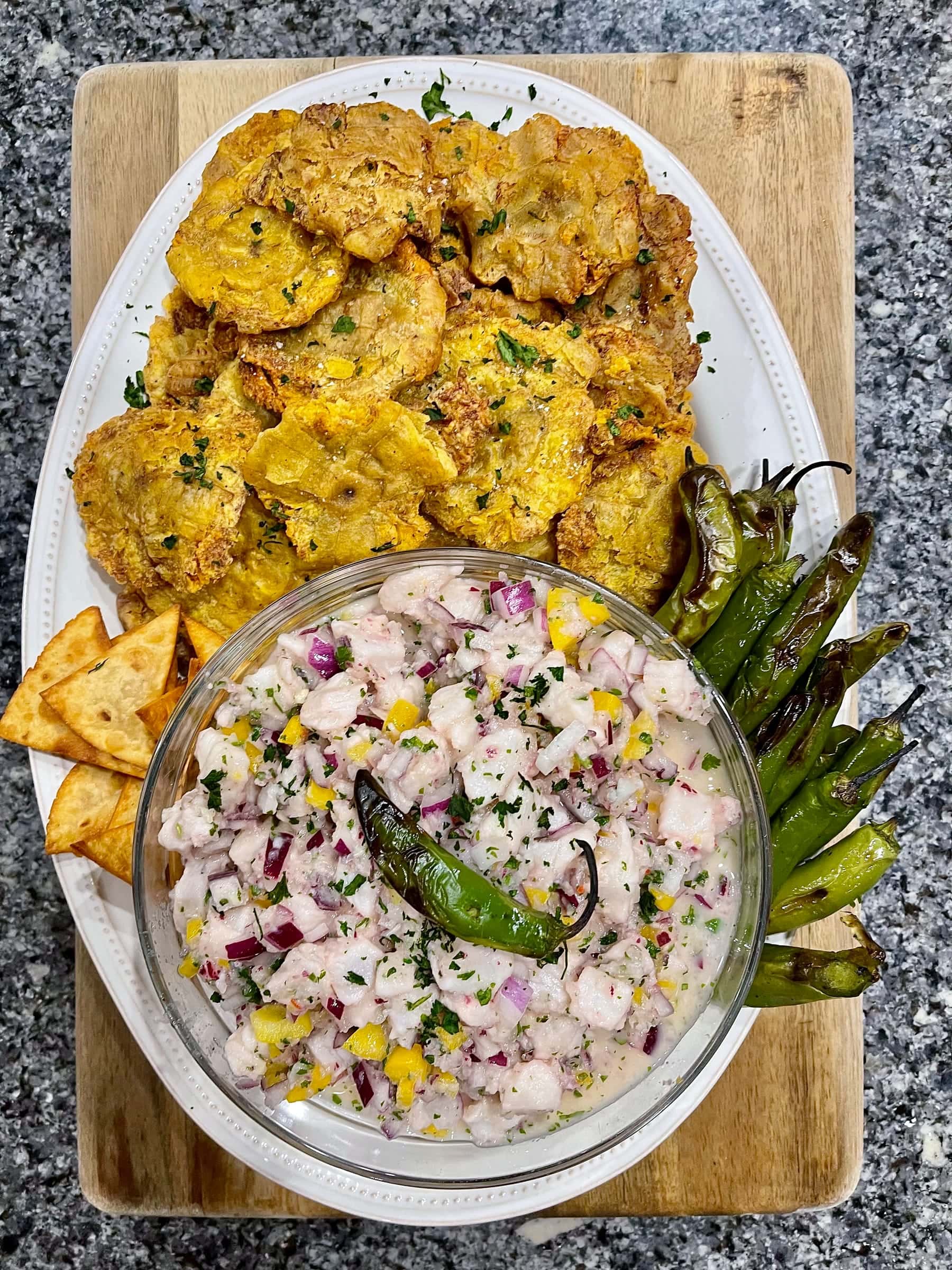 Ceviche served with tostones and tortilla chips