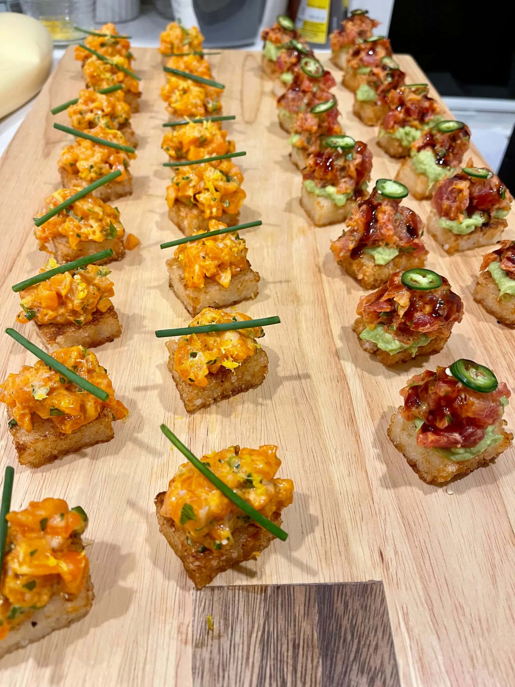 Crispy rice bites topped with spicy tuna and jalapeño