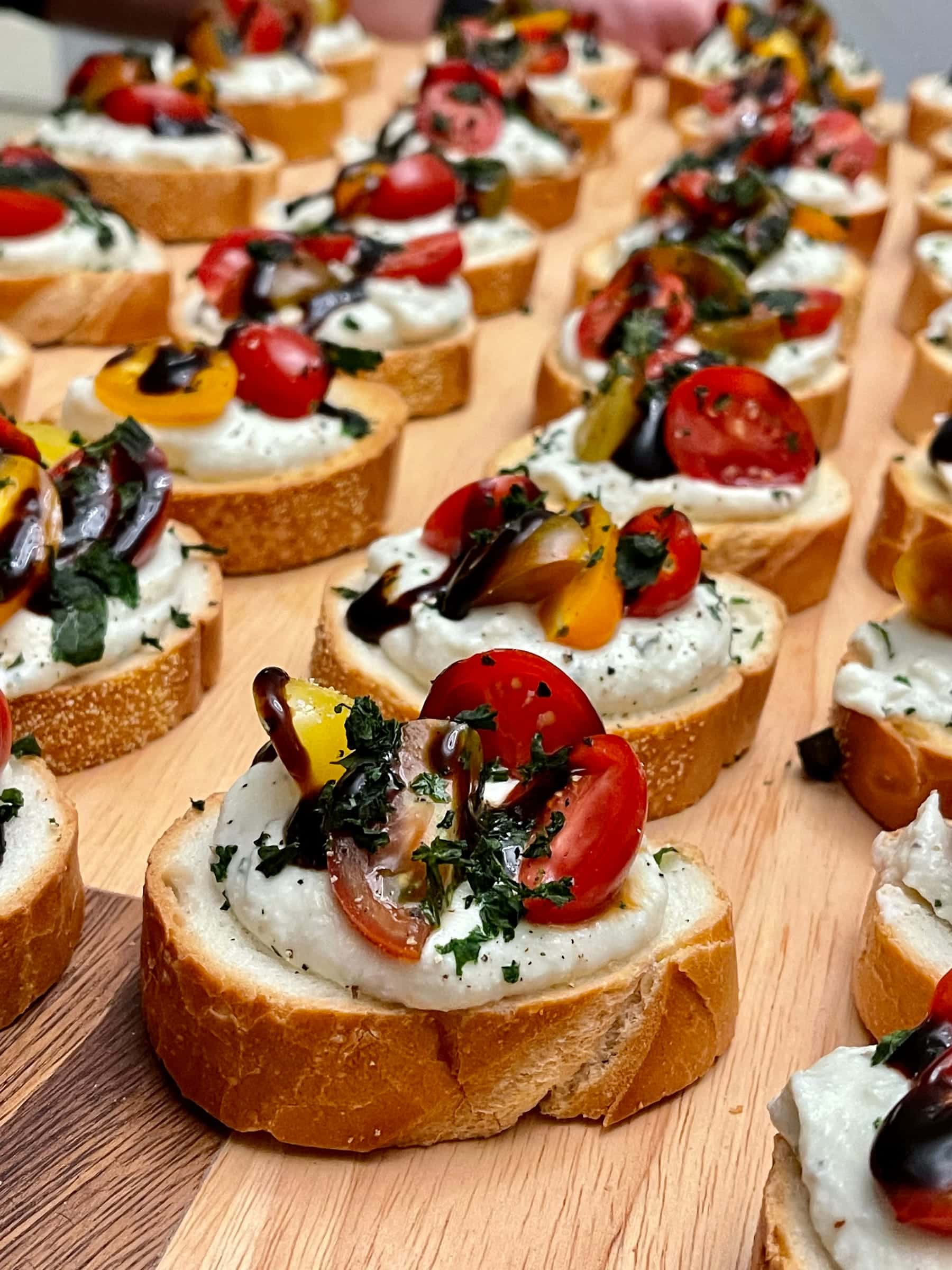 Heirloom tomato crostini with whipped ricotta and basil