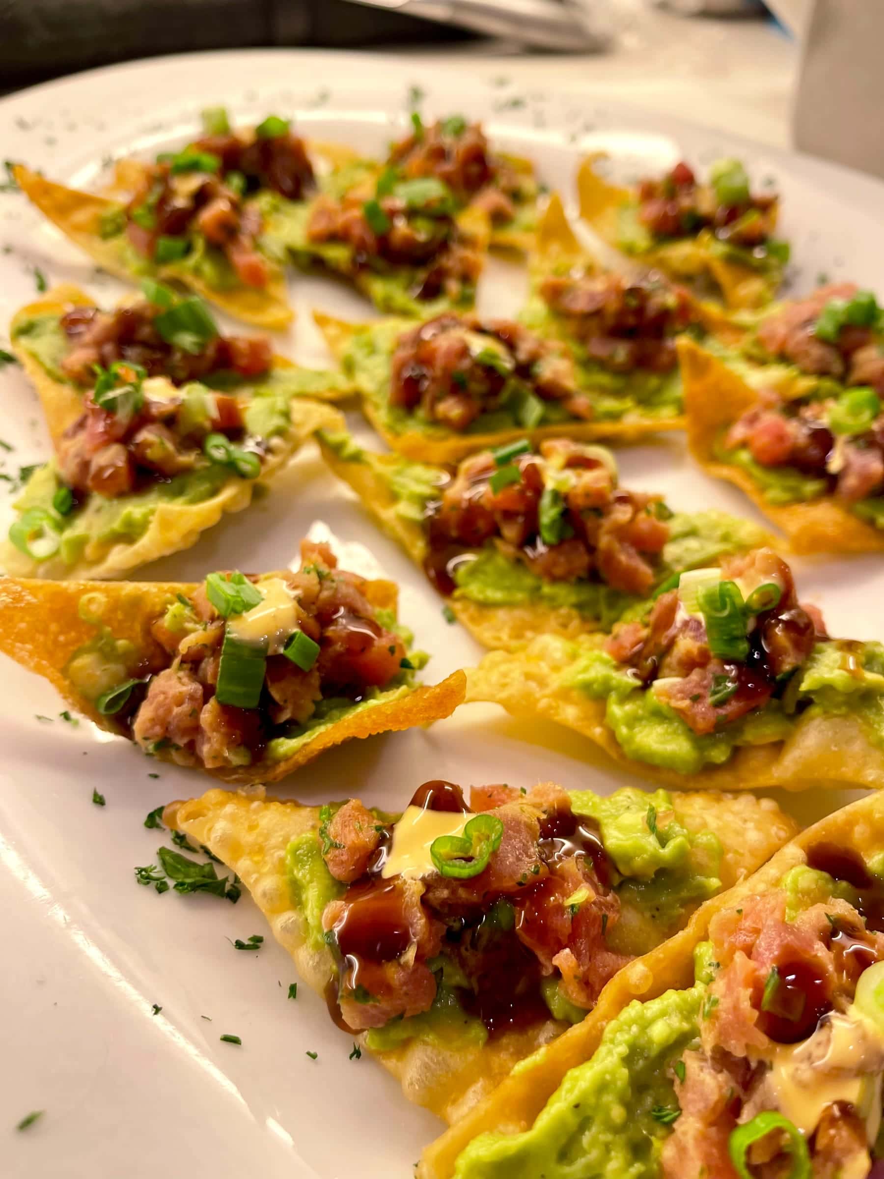 Tuna tostada bites with avocado and scallion